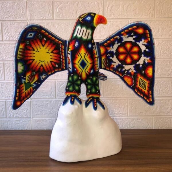 Eagle figurine Huichol Sculpture Of Mexican Folk Art, Eagle sculpture Wixarika As A Mexican Decorative Figure , Made Of Resin And Beads