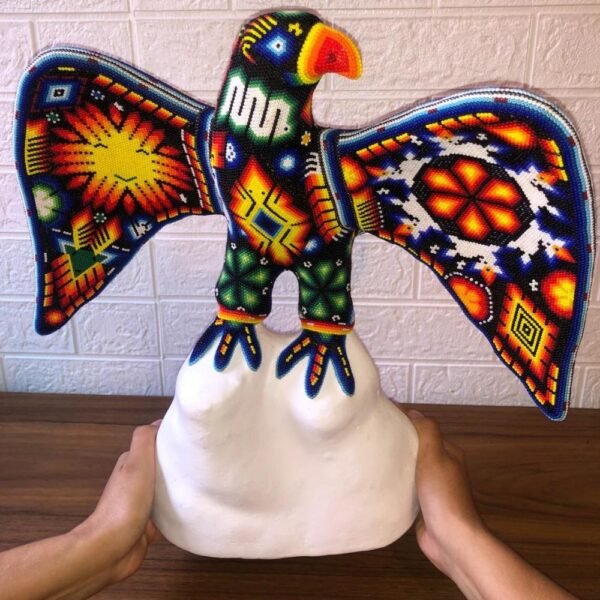Eagle figurine Huichol Sculpture Of Mexican Folk Art, Eagle sculpture Wixarika As A Mexican Decorative Figure , Made Of Resin And Beads