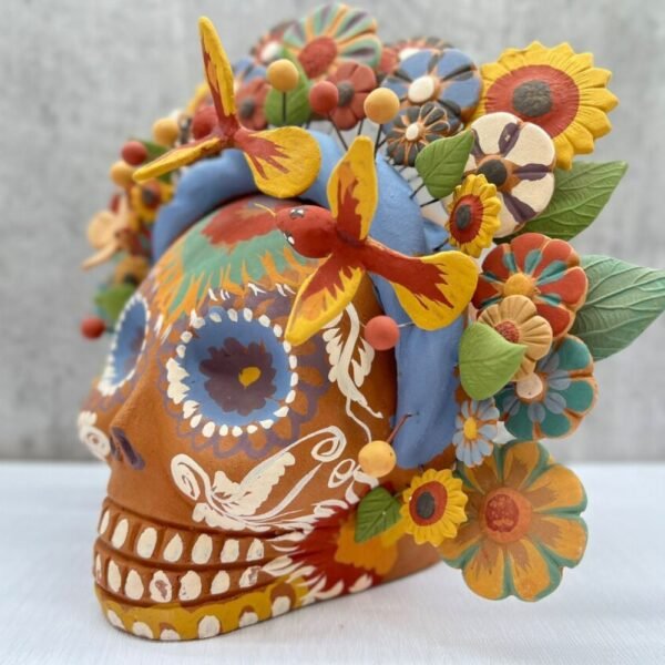 Sugar skull, Catrina, Day of the Dead ornaments, skull as Mexican decoration, human skull sculpture, technique “pigmento” natural colors.
