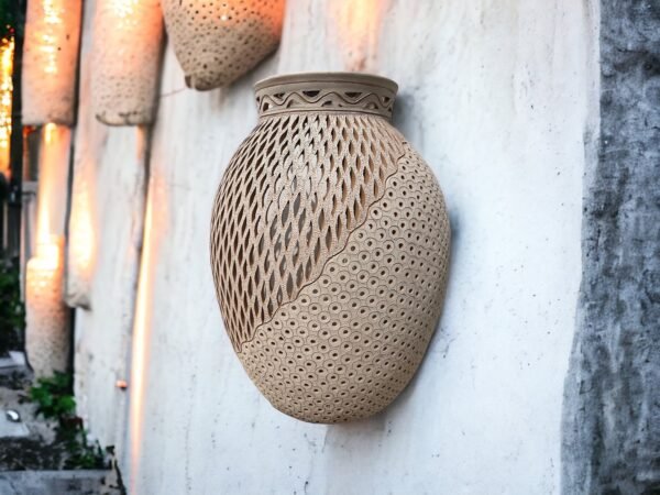 Elevate your space with the enchanting Oaxacan clay luminary wall art. Handcrafted with intricate details, it radiates warmth and cultural. - Image 5