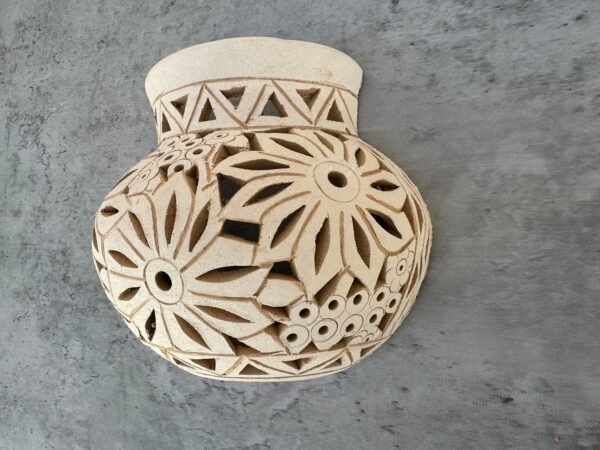 Elevate your space with the enchanting Oaxacan clay luminary wall art. Handcrafted with intricate details, it radiates warmth and cultural. - Image 2